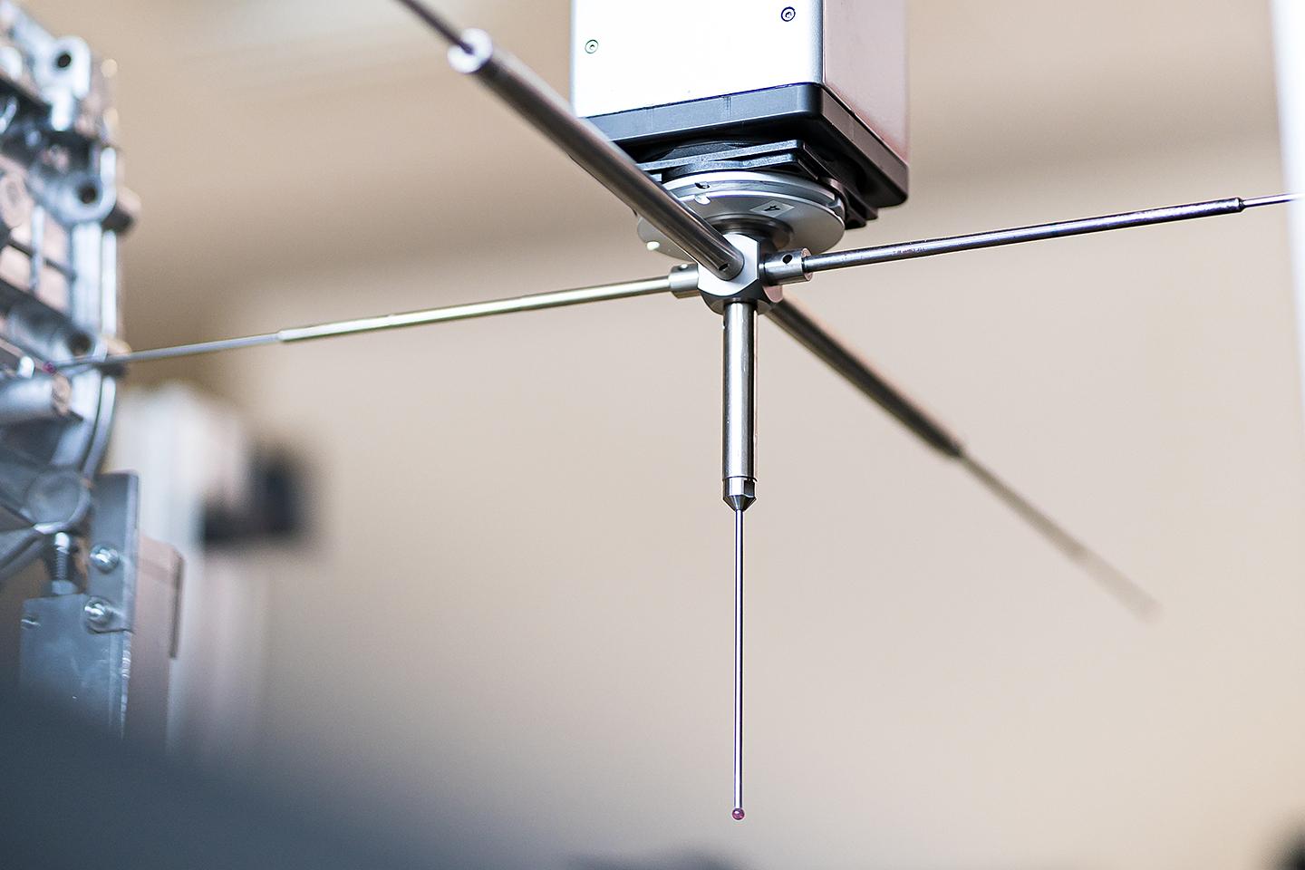 The ZEISS PRISMO CMMs then perform tactile measurements of specific features on the components.