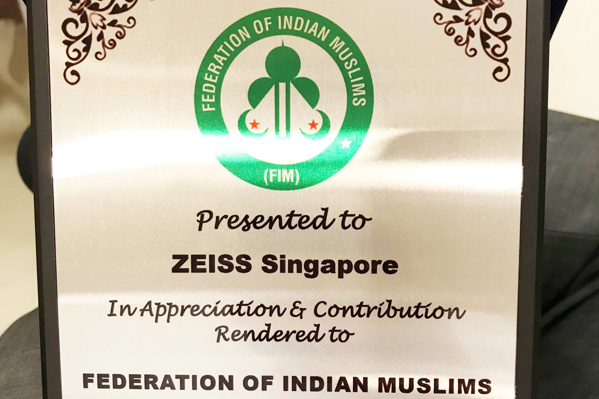 Image of a certificate from Federation of Indian Muslims presented to ZEISS Singapore in appreciation and contribution 