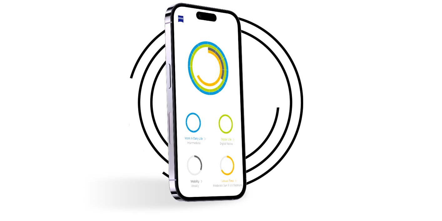 A smartphone in front of black rings shows the vision profile of a My Vision Profile  user with differently coloured rings.