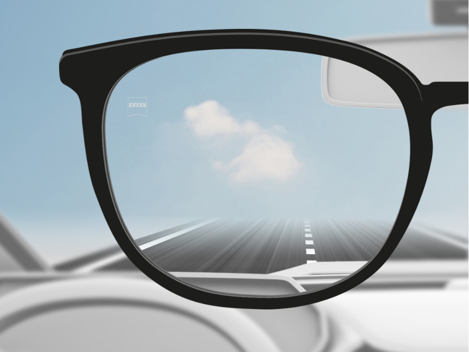 Schematic point-of-view illustration through a DriveSafe single vision lens showing a clear view of the road. . 